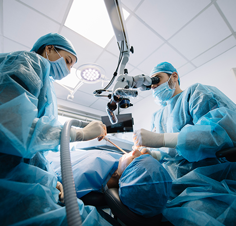 A team of dentist working on an oral surgery.